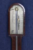 Rubergalli of London. A Regency mahogany stick barometer with silvered scale incorporating a