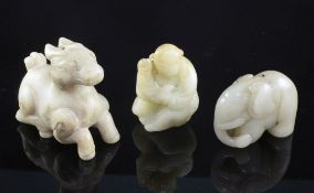 A Chinese grey jade figure of an elephant and two other jade figures, 19th century or later, the