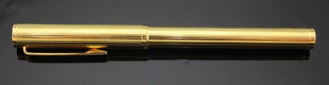 A 1970's gold plated Dunhill vintage fountain pen with 14ct gold nib, 5.25in. boxed.