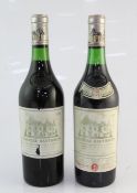 Two bottles of Chateau Haut-Brion, Premier Cru Classe, Graves, including one 1966, level 2cm, tear