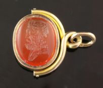 A late 19th/early 20th century Russian 56 zolotnik gold mounted carnelian intaglio fob seal