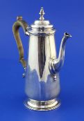 A late Victorian silver coffee pot, of tapering cylindrical form, with turned finial, Henry