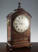 A Regency brass inset mahogany bracket clock, in arched architectural case with circular dial signed