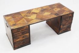 A Japanese Hakone wear marquetry cabinet / low desk, one flank with four drawers, the other with a