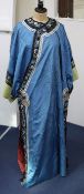 A Chinese blue silk, damask and embroidered lady's robe, late 19th / early 20th century, decorated