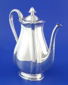 A late Victorian silver coffee pot, of tapering oval form, on shaped oval foot, Atkin Brothers,