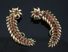 A pair of Middle Eastern? gold and red stone set curved full length earrings, the graduated square