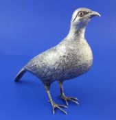 A 20th century Spanish silver free-standing model of a game bird, with textured feathers and red