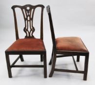 A pair of Chippendale style dining chairs, with pierced splat backs and drop in seats