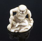 A Japanese ivory netsuke of Raiden (God of Thunder), signed Tomohiro, Edo period, seated on a