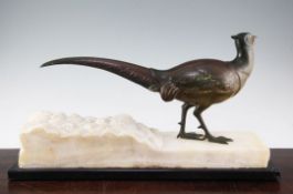 A French Art Deco patinated bronze model of a pheasant, on naturalistic marble base, 22.5in.