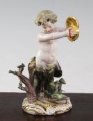 A Meissen figure of a satyr playing the cymbals, late 19th century, standing by a tree stump with
