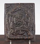 A Tibetan copper plaque of Mahakala and consort, 19th / 20th century, 19.5cm