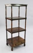 A William IV rosewood four tier whatnot, with single base drawer and turned bun feet, W.1ft 7.5in.