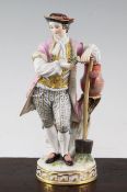 A Meissen figure of a gardener, late 19th century, holding a posy of flowers in his right hand and