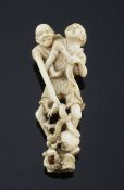 A Japanese ivory okimono of Ashinaga and Tenaga, Meiji period, finely carved with the figures