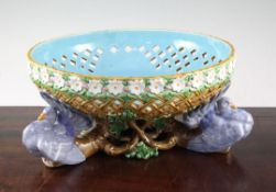A Minton majolica pierced 'dove' bowl, date code for 1870, the bowl with turquoise glazed interior
