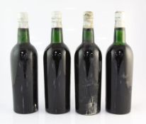 Four bottles of Warre 1955, bottled by John Harvey, Bristol, embossed white metal capsules, no