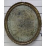 A 19th century oval needlework map sampler, detailing England and Wales within a floral border and