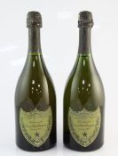 Two bottles of Dom Perignon 1970, 0.5-1cm, labels lightly scuffed, small parts of foil missing.