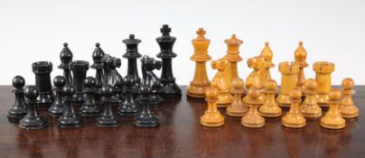 A Staunton pattern boxwood and ebonised wood chess set, complete with thirty two pieces, with 3.5