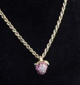 An 18ct gold, ruby and diamond set cluster pendant, modelled as a strawberry, together with a 14ct