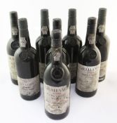 Eight assorted vintage ports including four Taylor 1985, and four Graham 1983; cellar-soiled