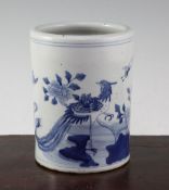 A Chinese blue and white cylindrical brush pot, 19th century, painted with a phoenix and other birds