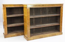 A pair of pollard oak and bird's eye yew open bookcases, inlaid with leafy scrolls, W.4ft 3.5in.