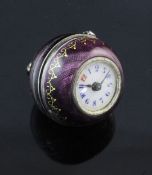 An early 20th century Swiss silver and amethyst guilloche enamel globe fob watch, with gilt scroll