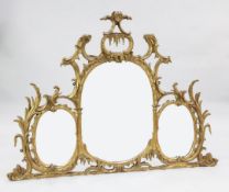 A fine George III Chippendale carved and giltwood wall mirror, of triple plate design set within a