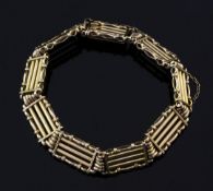 An Edwardian 15ct gold gate link bracelet, 23 grams, 7.25in.