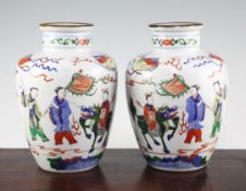 A pair of Chinese Wucai ovoid vases, Wanli marks, late 19th / early 20th century, each well
