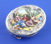 A late 19th/early 20th century Italian 800 standard silver and enamel oval pill box, box with chased