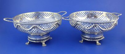 A pair of George V pierced silver two-handled sweetmeat bowls by William Hutton & Sons Ltd, with