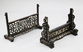 Two Chinese hardwood table screen stands, late 19th century, the first pierced with shou
