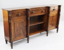 Attributed to Gillows of Lancaster. A Regency mahogany dwarf bookcase, with three frieze drawers