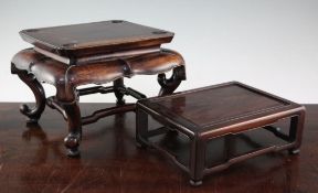 Two Chinese rosewood stands, 19th century, the larger with a shaped rectangular top with four