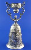 A 19th century German silver wager cup, of typical form, with embossed decoration, maker's mark MS