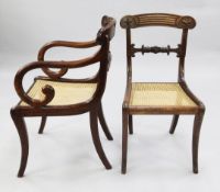 A set of eight Regency mahogany dining chairs, including two carvers, the reeded crest rails with