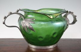 A Loetz style Art Nouveau iridescent green glass and pewter mounted bowl, c.1905, the dimple moulded