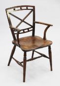 A 19th century fruitwood and elm Mendlesham armchair, with reeded X shape splat, on turned