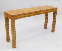 An unusual parquetry inlaid Continental rectangular side table, with square section legs, W.4ft 3in.