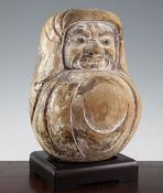 A Japanese carved and painted pine Daruma doll, 19th century, with remnants of polychrome