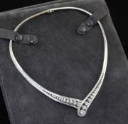 A modern stylish 18ct white gold and diamond necklace, with textured links and set with twenty