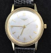 A gentleman's early 1960's 9ct gold Longines manual wind wrist watch, the silvered dial with baton