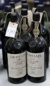 A nine bottle vintage port assortment including three Graham 1970, Oporto bottled in embossed