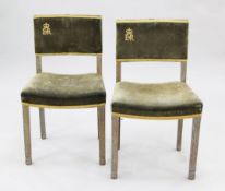 A pair of Elizabeth II limed oak coronation chairs, the velvet upholstered backs marked with ER