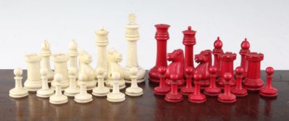 A Victorian Staunton pattern turned bone chess set, red stained opposing natural bone, complete with