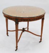 A Sheraton revival circular satinwood and floral painted centre table, the top painted with